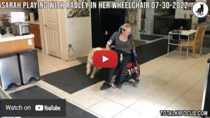 Sarah Playing with Radley in Her Wheelchair 07-30-2022